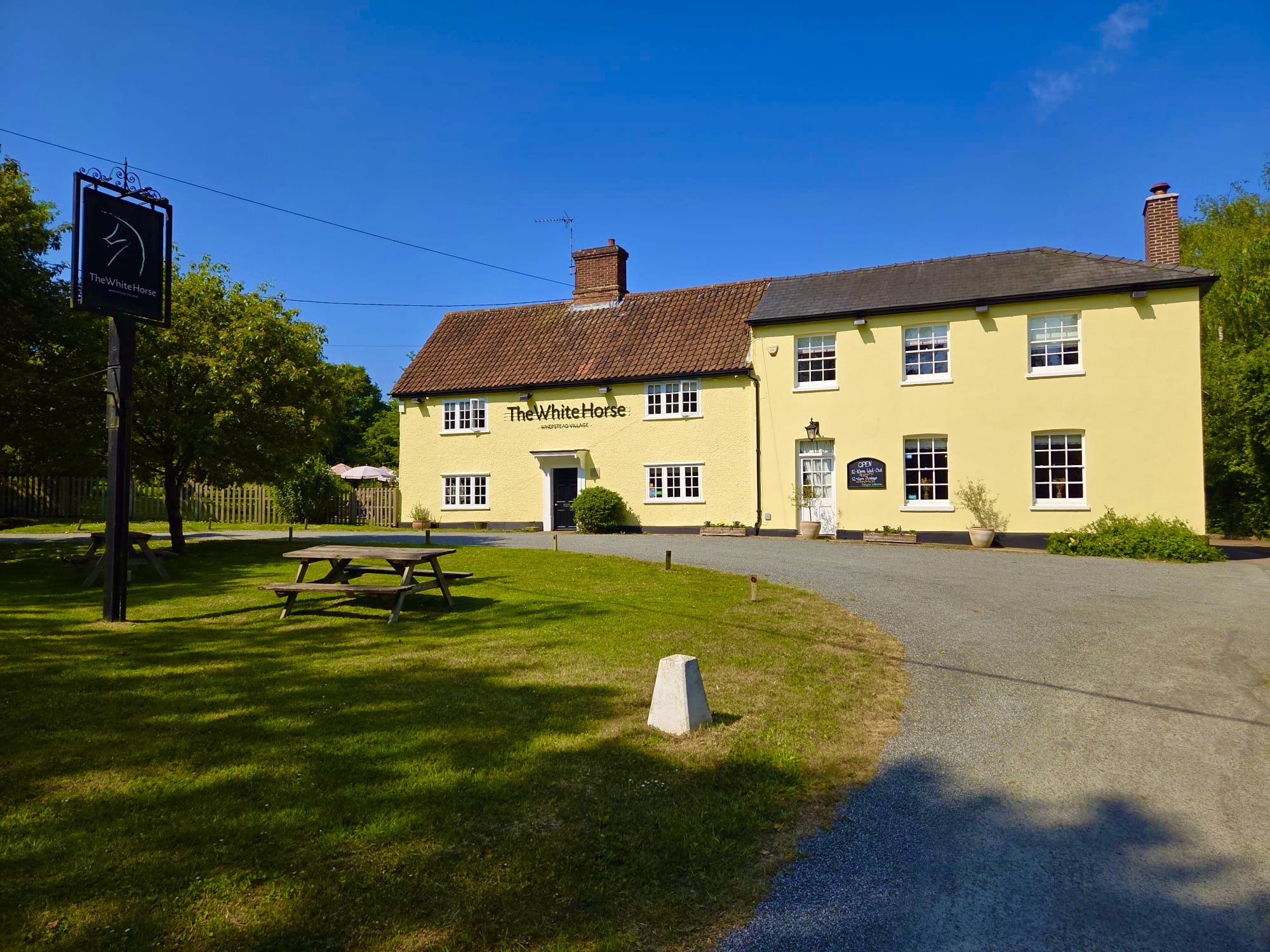 The White Horse pub exterior on a sunny day